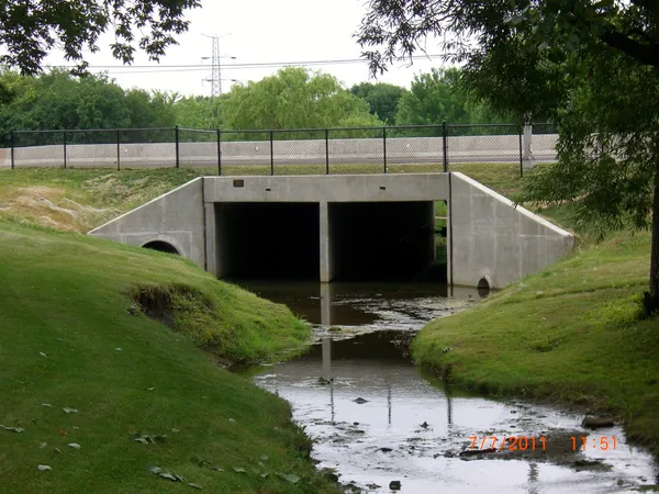 Multi-barrel reinforced concrete box culvert with headwall and channel, typical structure inspected by CIA